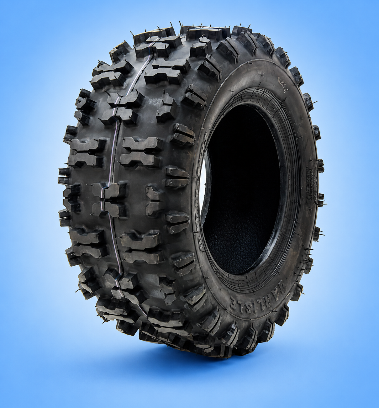 Knobby Carlisle ATV mud tire on a blue background.