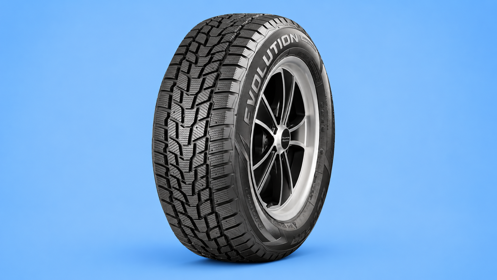 A Cooper Evolution Winter tire mounted on a black and silver rim against a blue background.