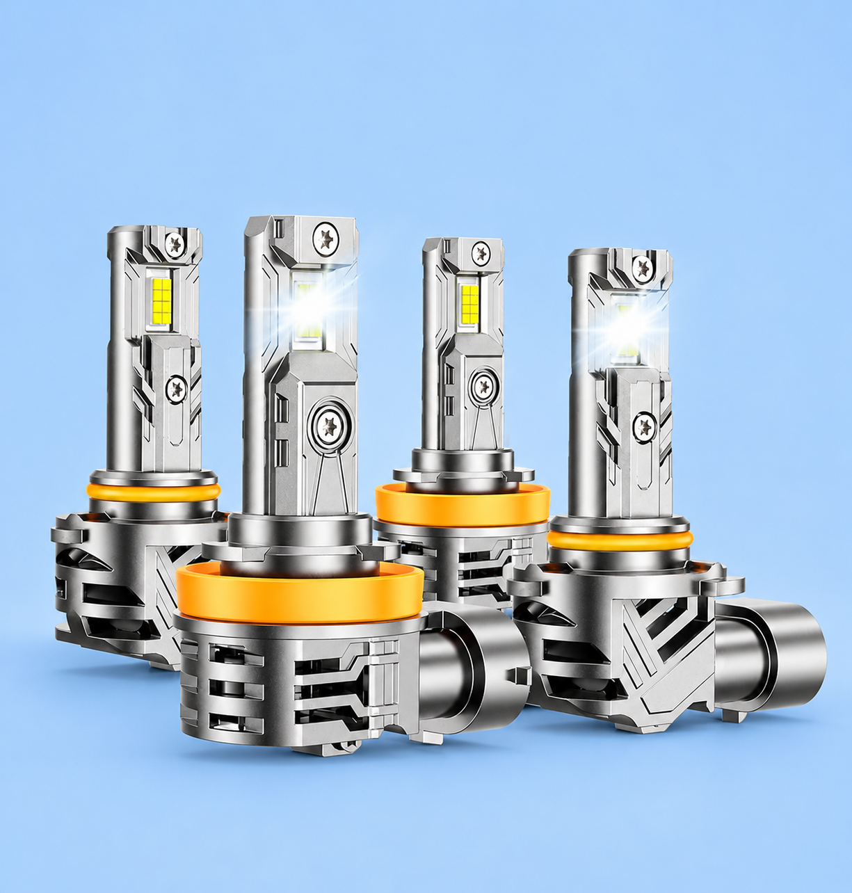Four silver LED headlight bulbs on a solid blue background.