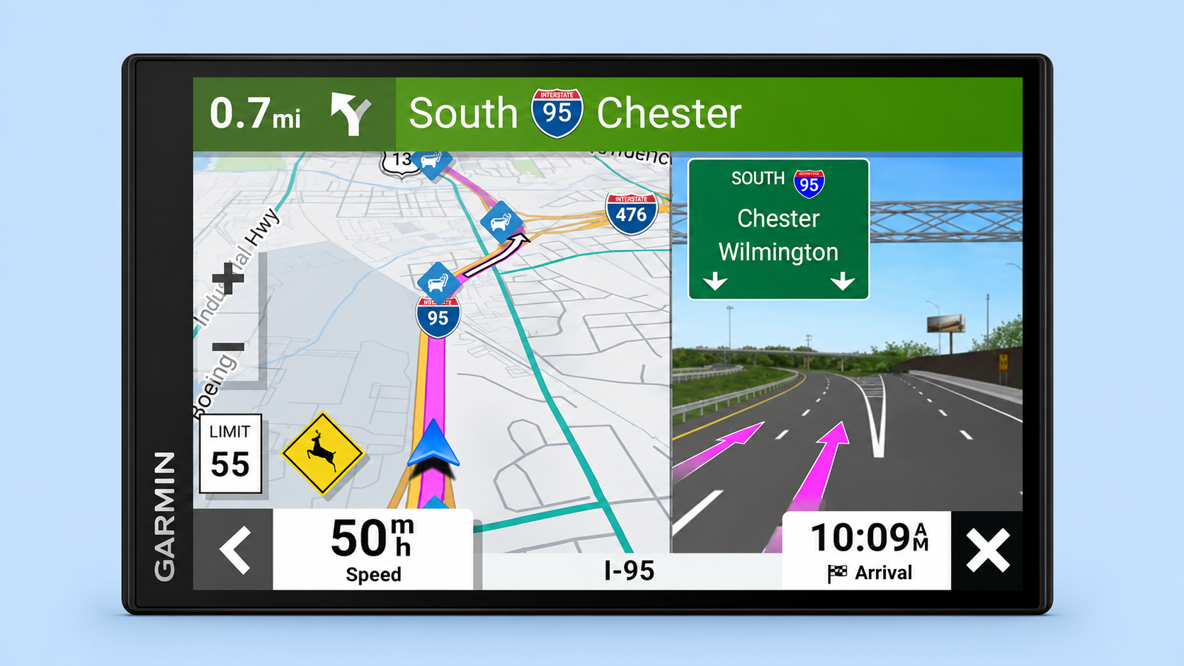 A Garmin GPS device displaying highway navigation and lane guidance.