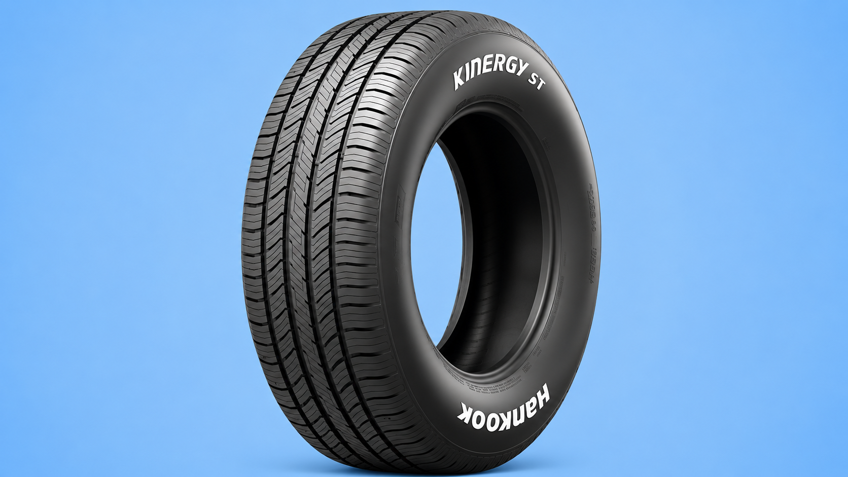 Hankook Kinergy ST tire without a rim against a blue background.
