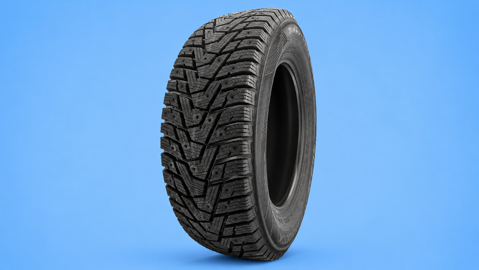 A Hankook Winter i*Pike studdable snow tire without a rim against a blue background.
