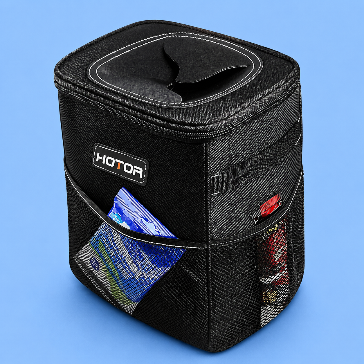 A black Hotor car trash can with side mesh pockets on a blue background.
