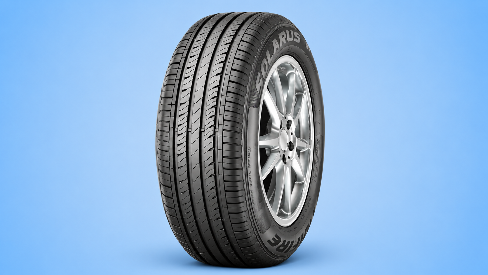 A Starfire Solaris AS car tire mounted on a silver rim against a blue background.