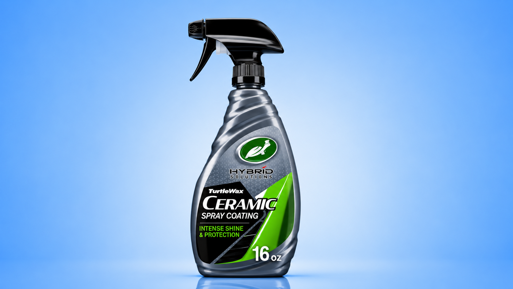 A 16 oz bottle of Turtle Wax Hybrid Solutions Ceramic Spray Coating against a blue background.
