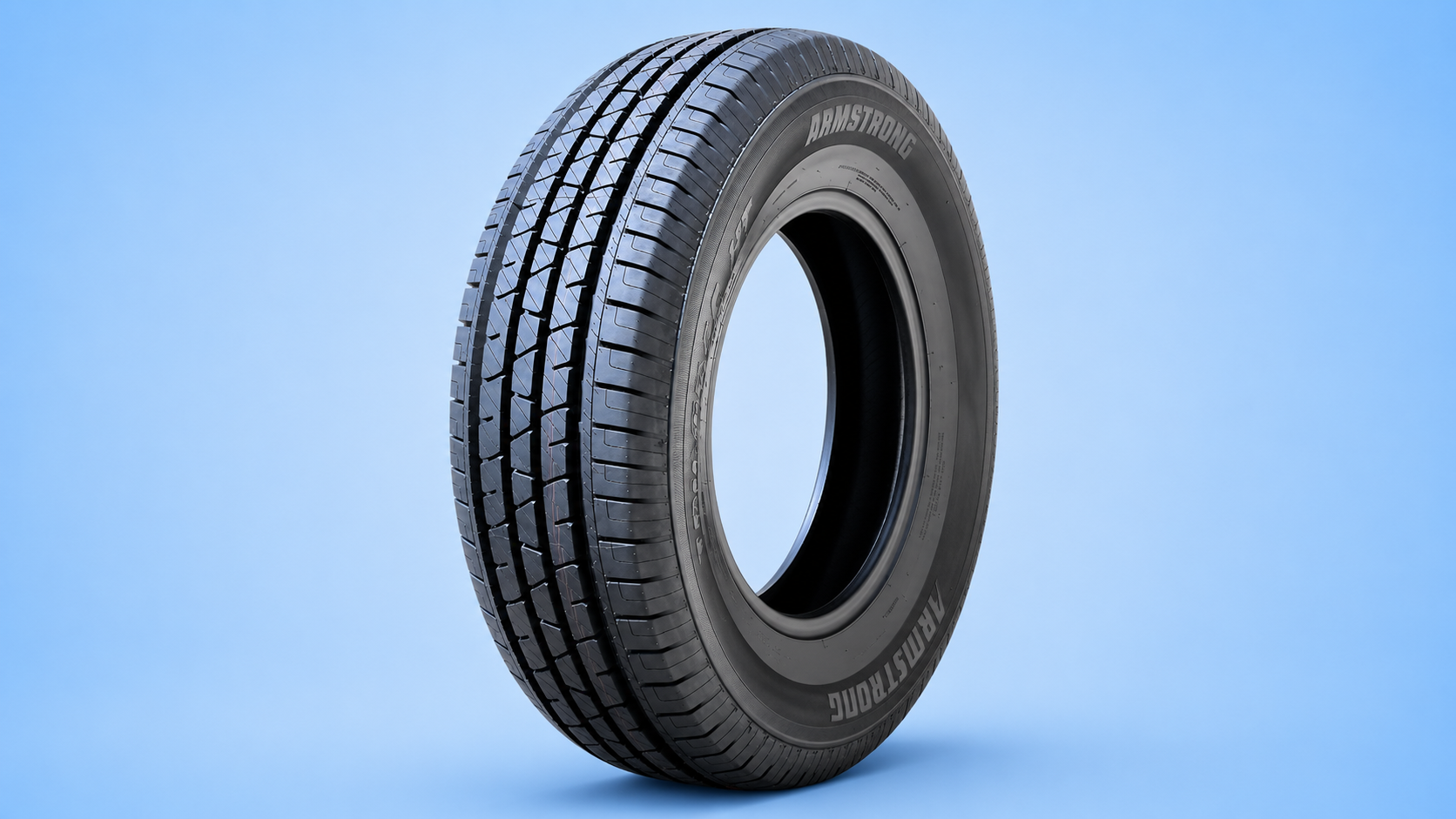 Armstrong Tru-Trac HT highway terrain tire standing vertically against a light blue background.